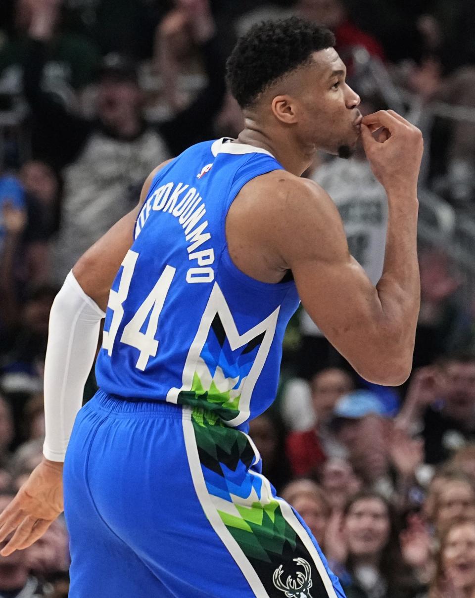 Milwaukee Bucks' Giannis Antetokounmpo (34) reacts after hitting a three-point shot during the first half of their game against the Orlando Magic Wednesday, March 1, 2023 at Fiserv Forum in Milwaukee, Wis.