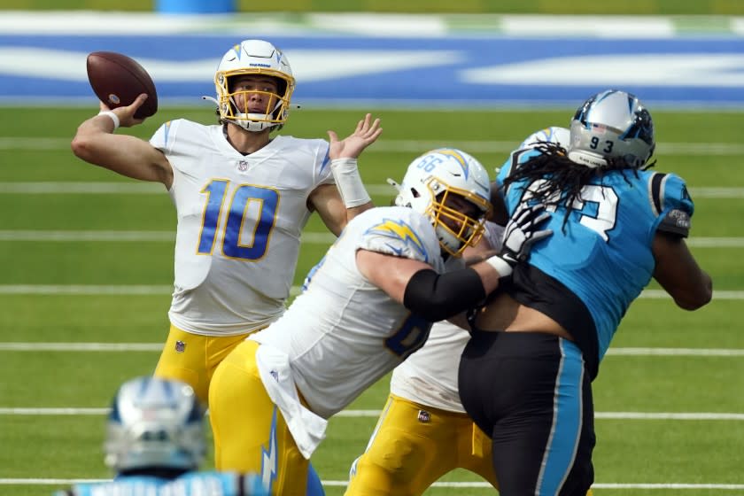 Los Angeles Chargers quarterback Justin Herbert (10) throws against the Carolina Panthers.