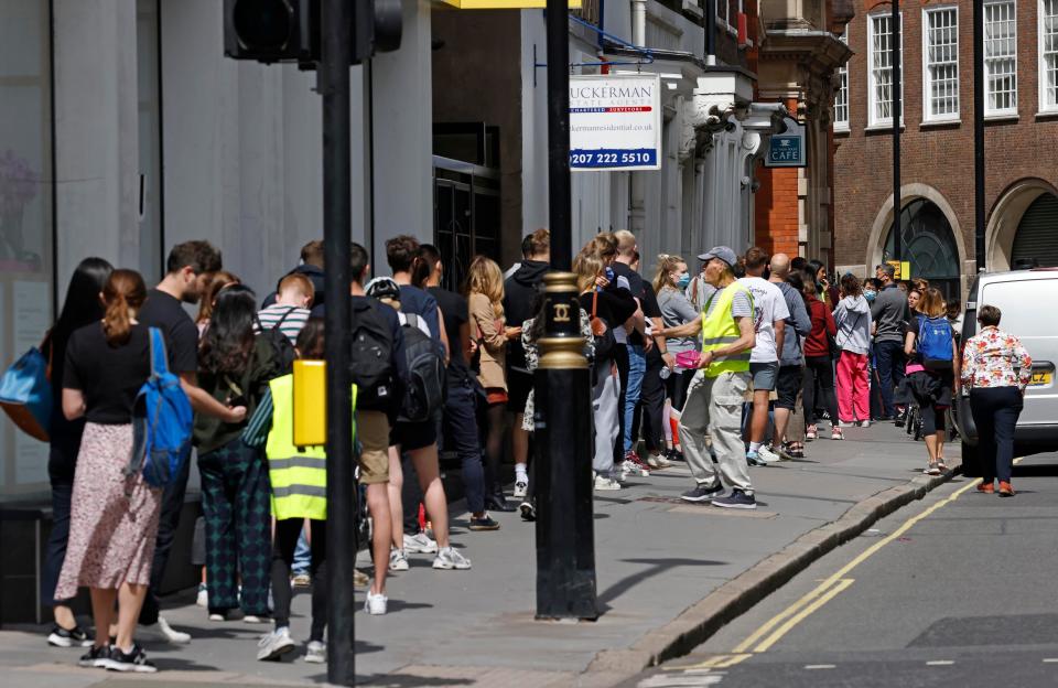 Young people queue for a Covid vaccine in London (Nigel Howard)