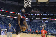 New Orleans Pelicans forward Zion Williamson goes to the basket before the start of an NBA basketball game against the Chicago Bulls in New Orleans, Wednesday, Jan. 8, 2020. Williamson is not scheduled to play. (AP Photo/Matthew Hinton)