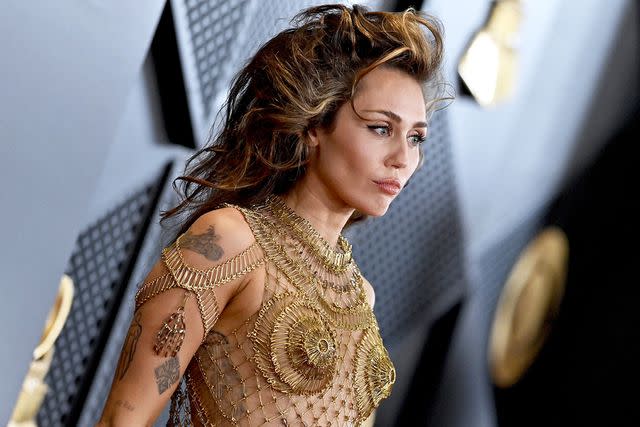 <p>Axelle/Bauer-Griffin/FilmMagic</p> Miley Cyrus at 2024 Grammys