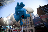 The Smurf balloon makes its way through Times Square in Macy's Thanksgiving Day parade on November 24, 2011 in New York City. The 85th annual event is the second oldest Thanksgiving Day parade in the U.S. (Photo by Michael Nagle/Getty Images)