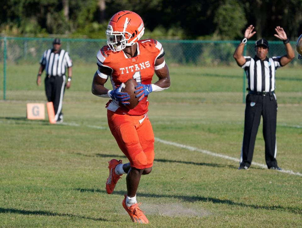 University's Noble Thomas (1) goes in for the score during a game with Monarch in Deltona, Thursday, August 19, 2021.