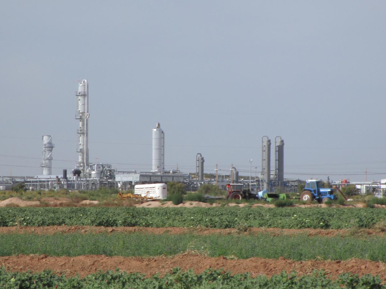 DCP Midstream Bounds Booster Station with farmland in the foreground.