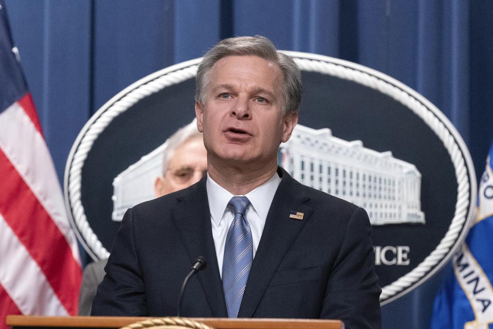 Federal Bureau of Investigation (FBI) Director Christopher Wray speaks during a news conference to announce an international ransomware enforcement action, at the Department of Justice in Washington, Thursday, Jan. 26, 2023. The FBI has seized the website of a prolific ransomware gang that has heavily targeted hospitals and other healthcare providers. ( AP Photo/Jose Luis Magana)