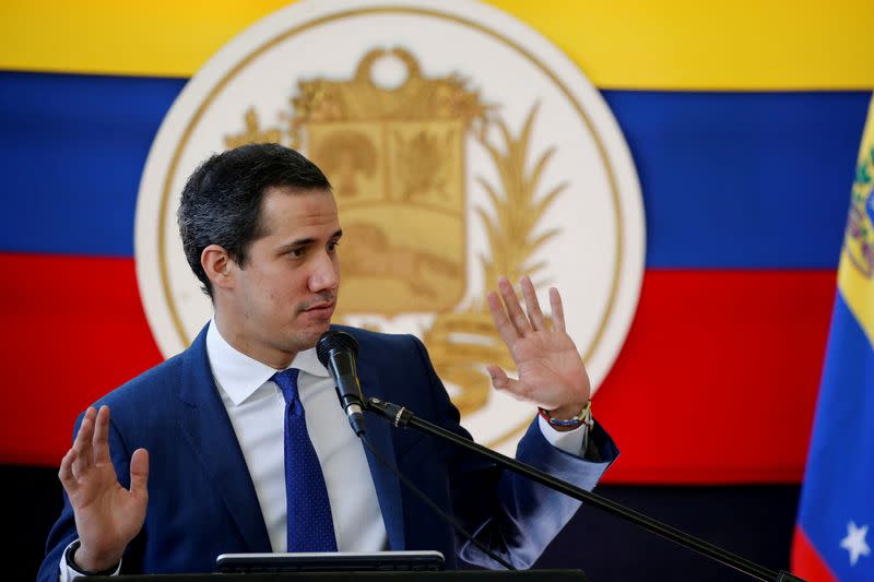 FILE PHOTO: Venezuela's opposition leader Juan Guaido addresses the media the day after regional and local elections, in Caracas