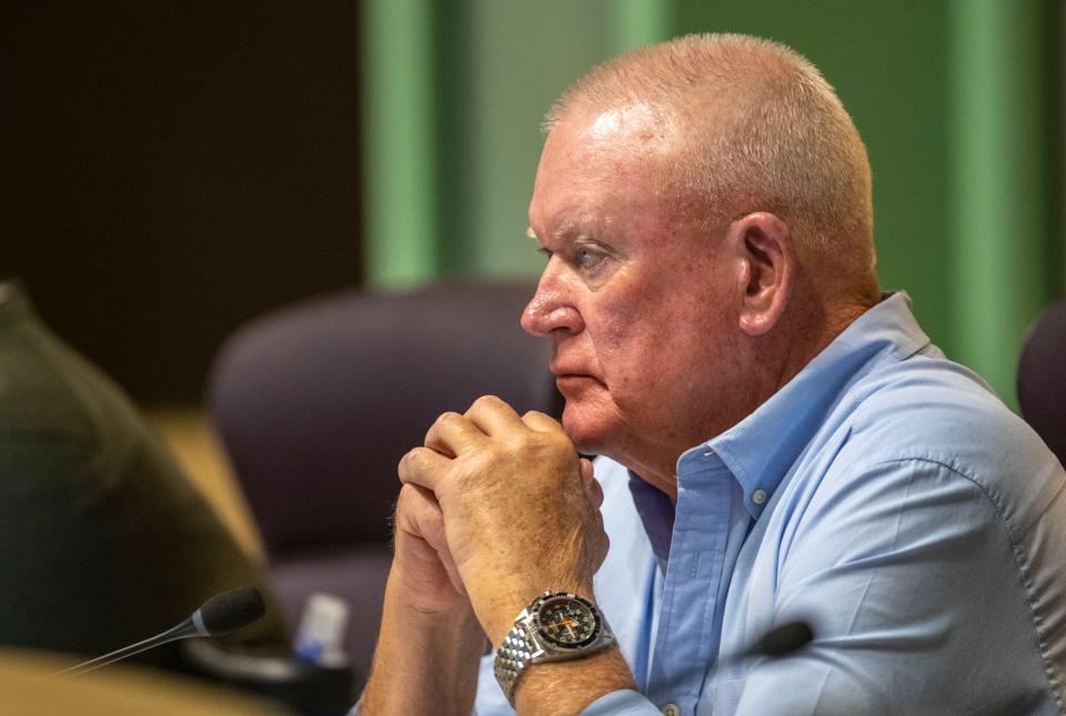 Commissioner Michael Proctor listens to a presentation by John Gamlin, president of Coral Mountain Wave Development LLC, to the La Quinta Planning Commission at La Quinta City Hall in La Quinta, Calif., Tuesday, March 22, 2022.