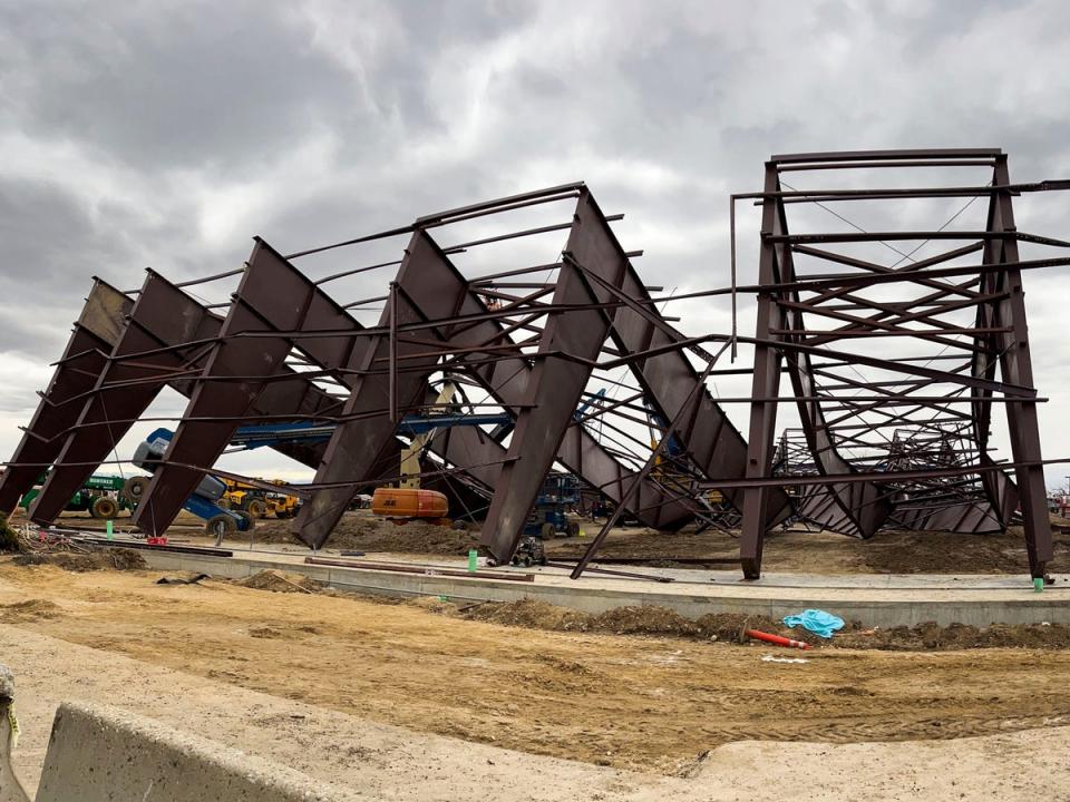 Twisted girders and debris cover the ground from a deadly structure collapse at a construction site near the Boise Airport on Thursday, Feb. 1, 2024 in Boise, Idaho (AP)