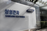 A logo of Samsung Electronics is seen outside of Samsung Electronics Seocho building in Seoul, South Korea, Sunday, Oct. 25, 2020. Billionaire Samsung scion Lee Jae-yong was sent back to prison on Monday after a South Korean court sentenced him to two and a half years over his involvement in a 2016 corruption scandal that spurred massive street protests and ousted South Korea’s then-president. (AP Photo/Lee Jin-man)