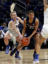DePaul guard Lexi Held, left, tries to steal the ball from Connecticut guard Evina Westbrook (22) in the first half of an NCAA college basketball game at Wintrust Arena in Chicago on Wednesday, Jan. 26, 2022. (Chris Sweda/Chicago Tribune via AP)