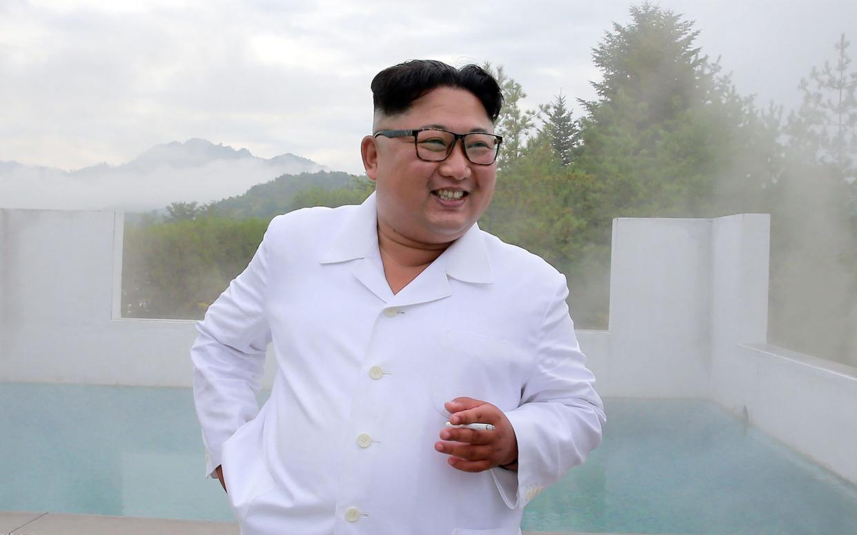 Kim Jong-un's distinctive hairdo is apparently not on the list of state-approved styles - AFP