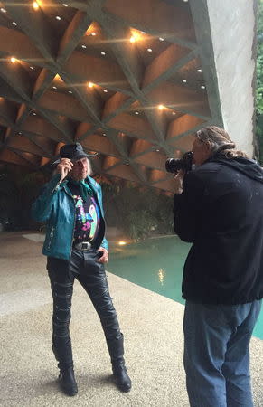 Owner James Goldstein poses for a photo at his residence, which was designed by modernist architect John Lautner, during a media event in Los Angeles, California February 17, 2016. REUTERS/Piya Sinha-Roy