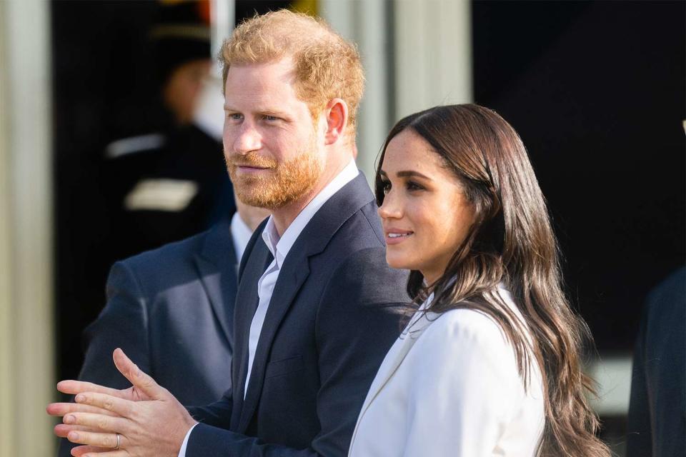 <p>Samir Hussein/WireImage</p> Prince Harry and Meghan Markle at the Invictus Games in 2022