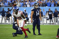 Tennessee Titans place kicker Randy Bullock (14) reacts after missing a field goal during the second half of an NFL football game against the New York Giants Sunday, Sept. 11, 2022, in Nashville. The Giants defeated the Titans 21-20. (AP Photo/Mark Zaleski)