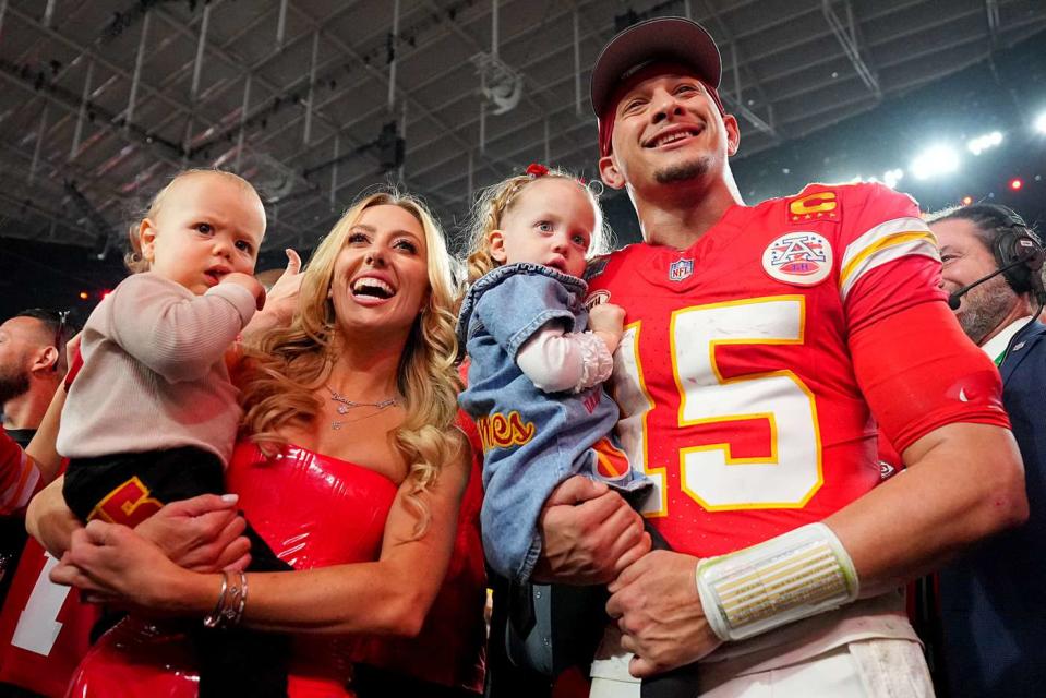<p>Erick W. Rasco/Sports Illustrated via Getty </p> Kansas City Chiefs Patrick Mahomes poses with wife Brittany Mahomes and their children Patrick Bronze and Sterling Skye following victory vs San Francisco 49ers at Allegiant Stadium.