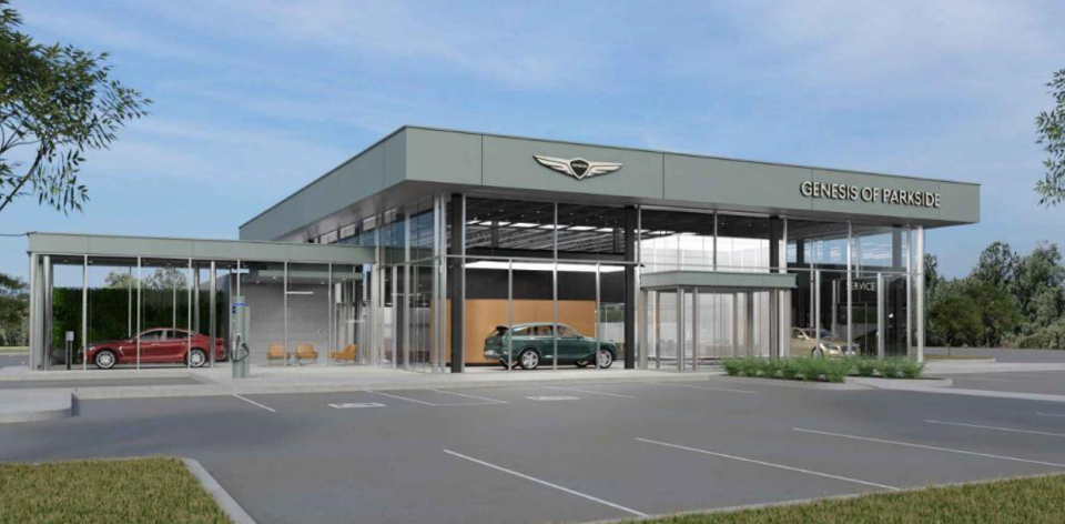 A rendering shows what the Genesis Dealership will look like. This section of the building faces 2nd Street S., looking onto the open sales lots. The total length of the front façade is 121.'