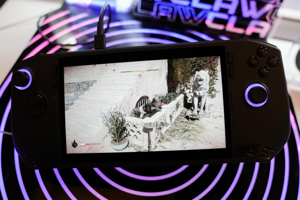 The MSI Claw portable gaming console is displayed during the CES tech show Wednesday, Jan. 10, 2024, in Las Vegas. (AP Photo/Ryan Sun)