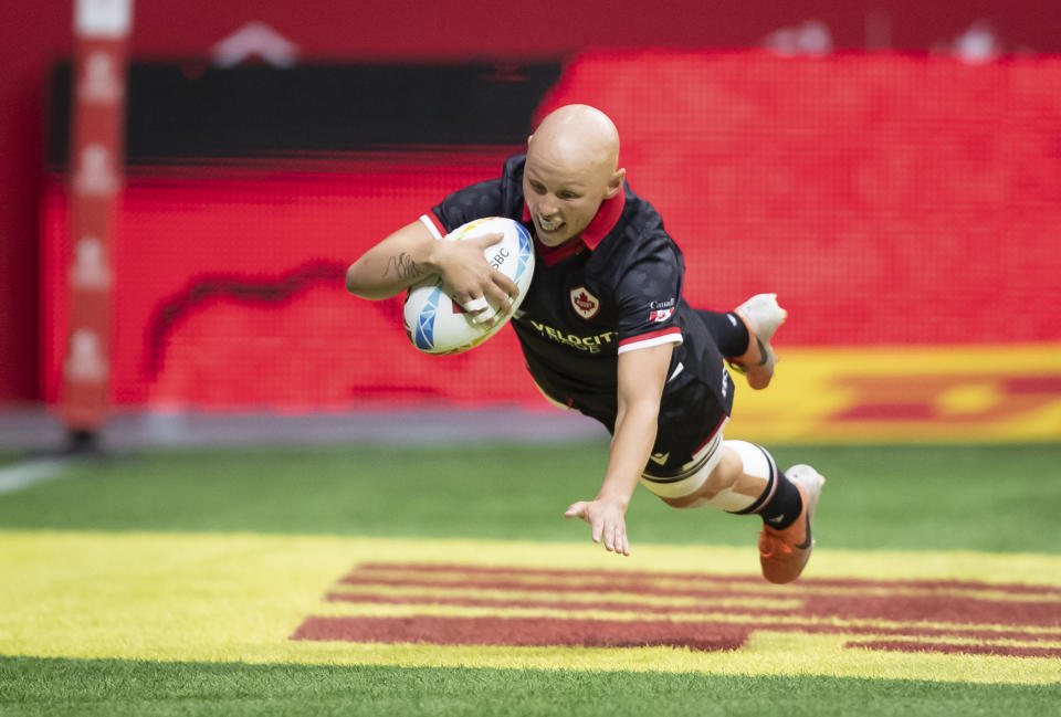 Canada's Olivia Apps scores a try against Mexico during HSBC Canada Sevens women's rugby match action in Vancouver, British Columbia, Sunday, Sept. 19, 2021. (Darryl Dyck/The Canadian Press via AP)