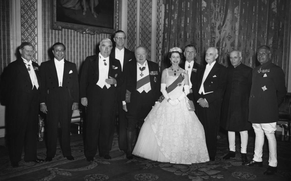Sir Winston Churchill and the Queen, centre, meeting leaders of the Commonwealth in 1955 - Ullstein Bild via Getty Images