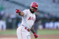 Los Angeles Angels' Luis Rengifo gestures toward teammates after hitting a home run against the Oakland Athletics during the first inning of a baseball game in Oakland, Calif., Monday, Aug. 8, 2022. (AP Photo/Jeff Chiu)