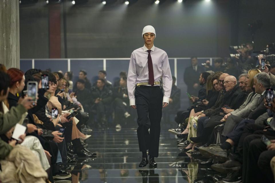 A model wears a creation part of the men's Prada Fall-Winter 2024-2025 collection, that was presented in Milan, Italy, Sunday, Jan. 14, 2024. (AP Photo/Luca Bruno).