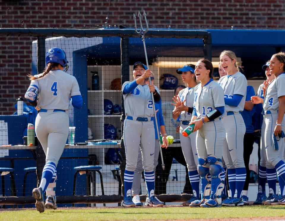 Duke’s Ana Gold is congratulated by teammates after a two-run home run in the fourth inning of the Blue Devils’ 6-0 win over Longwood on Wednesday, April 24, 2024, in Durham, N.C.