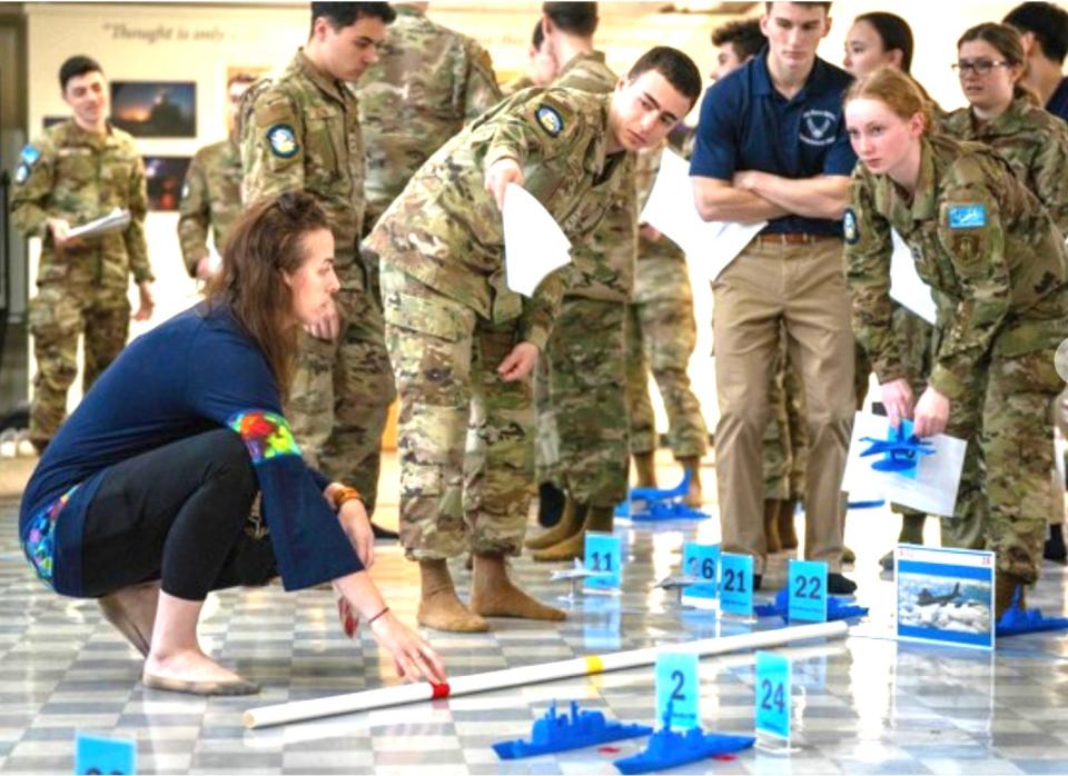 ROTC cadets seem fully involved in simulation hosted by the Naval War College’s Wargaming Department on March 20. NWC’s McCarty Little Hall boasts a 111,000-square-foot wargaming facility, one of the finest in the world.