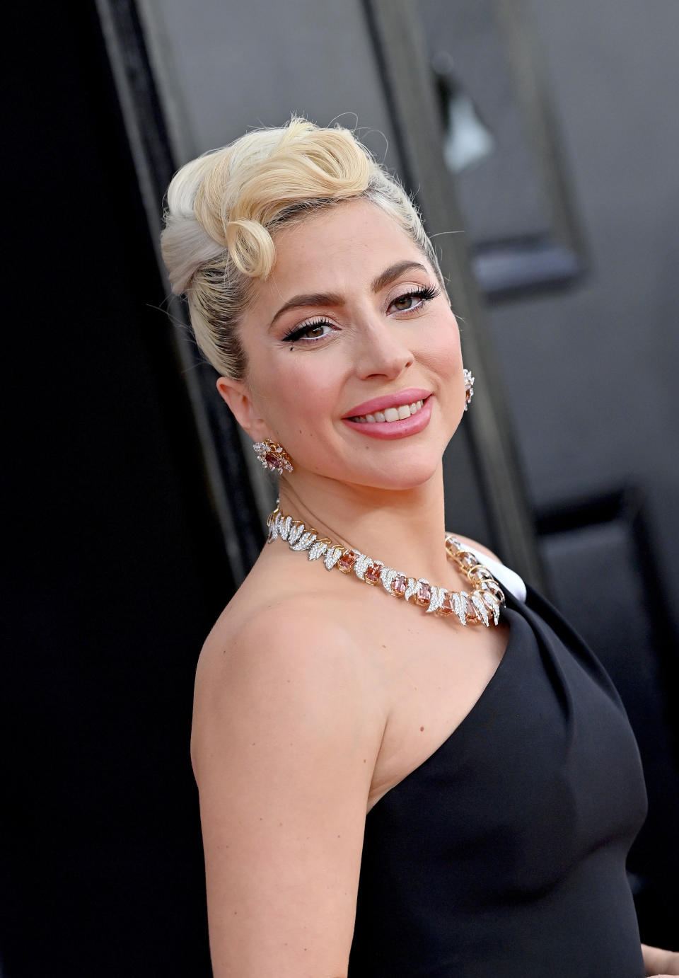 Lady Gaga smiles as she's pictured at the Grammy Awards