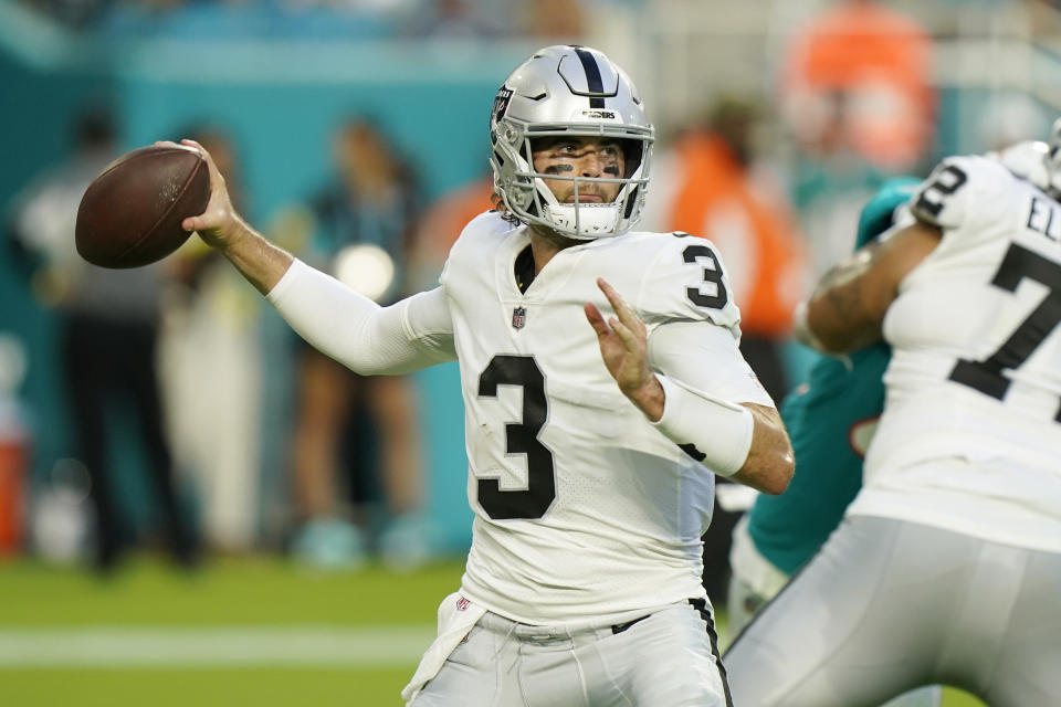 Las Vegas Raiders quarterback Jarrett Stidham (3) aims a pass during the first half of a NFL preseason football game against the Miami Dolphins, Saturday, Aug. 20, 2022, in Miami Gardens, Fla. (AP Photo/Wilfredo Lee)