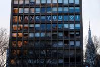 "Thank You" spelled in building windows during outbreak of coronavirus disease (COVID-19) in New York