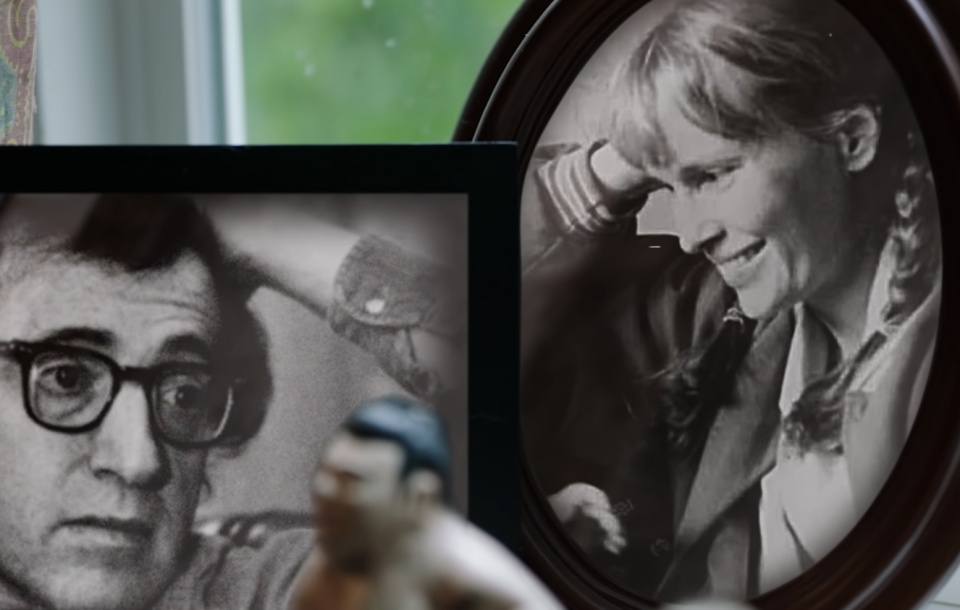 Framed pictures of Allen and Mia Farrow in Farrow's home