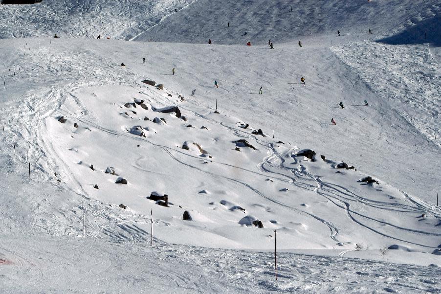 View taken Tuesday Jan. 7, 2014 of French Alps ski resort of Meribel, and the rocks between the slopes where former seven-time Formula One champion Michael Schumacher injured his head during a ski accident. Schumacher has been in a medically induced coma in the Grenoble hospital since Sunday, Dec. 29, 2013, when he struck his head on a rock while on a family vacation. (AP Photo/Claude Paris)