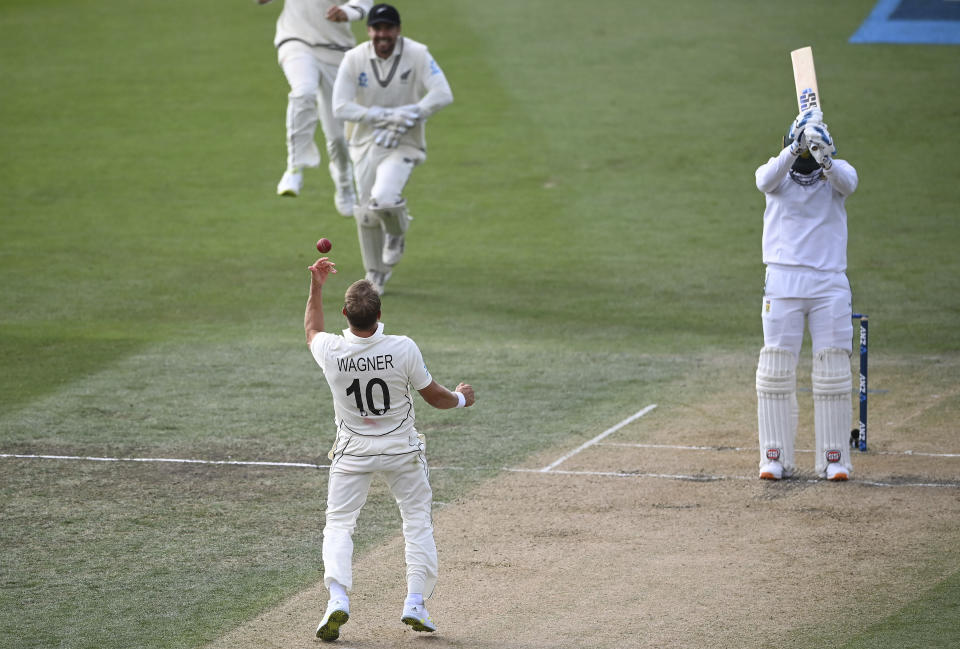 New Zealand bowler Neil Wagner celebrates the wicket of Rassie van der Dussen during play on day three of the second cricket test between South Africa and New Zealand at Hagley Oval in Christchurch, New Zealand, Sunday Feb. 27, 2022.(Andrew Cornaga/Photosport via AP)