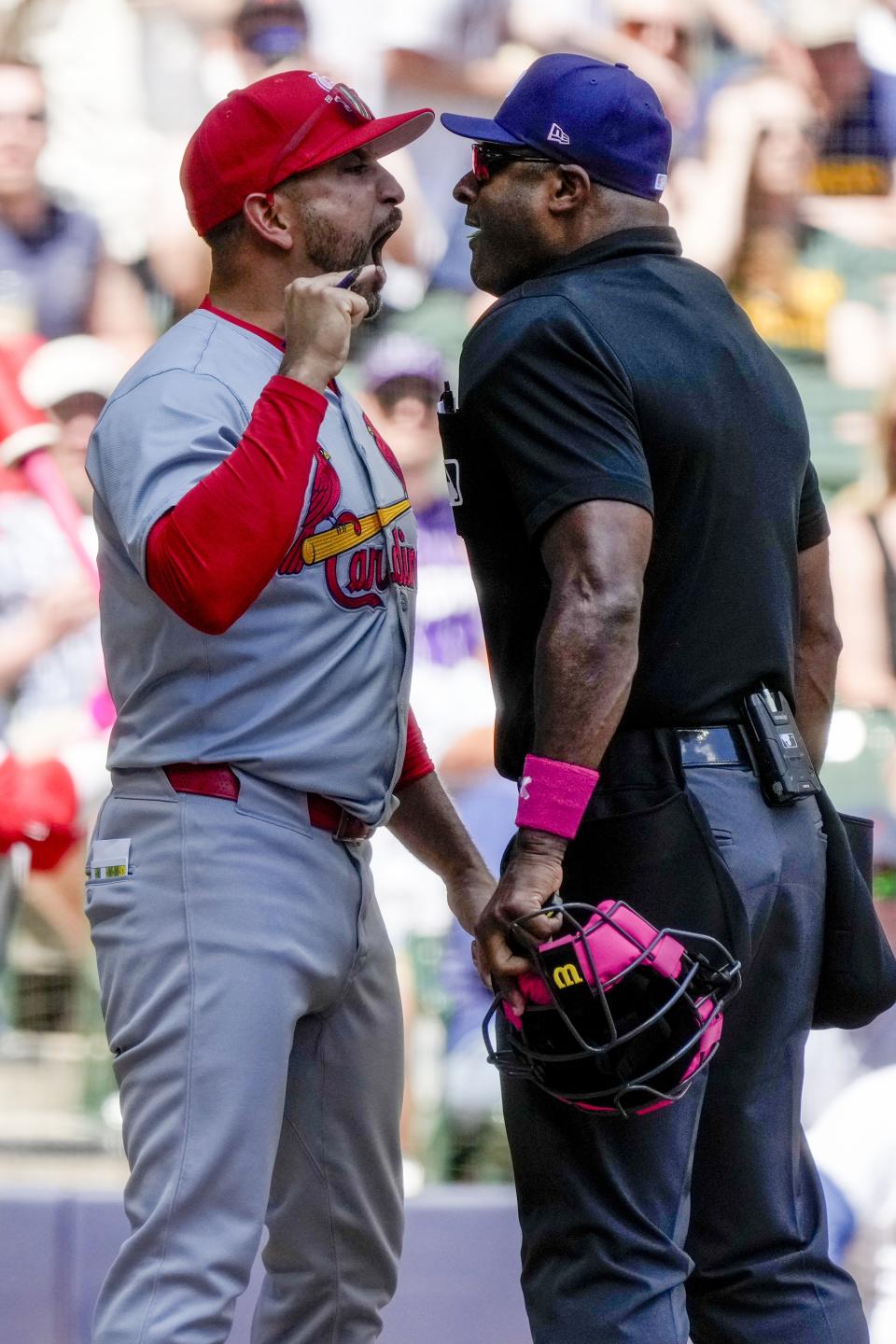 St. Louis Cardinals manager Oliver Marmol argues with home plate umpire Alan Porter during the third inning of a baseball game against the Milwaukee Brewers Sunday, May 12, 2024, in Milwaukee. Marmol was ejected from the game. (AP Photo/Morry Gash)