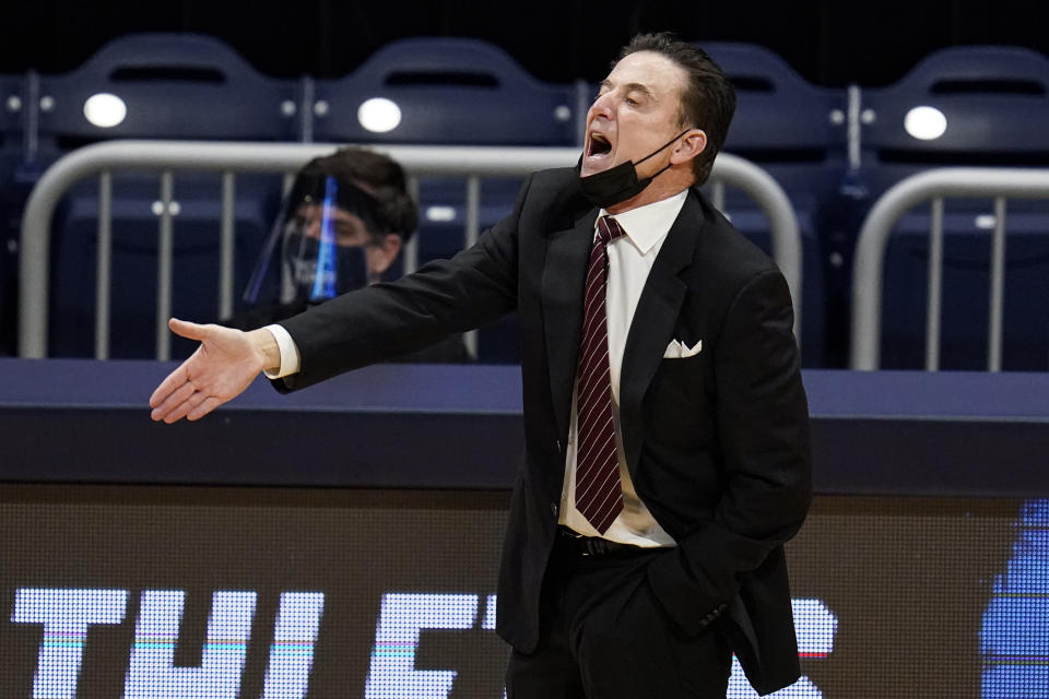 FILE - Iona head coach Rick Pitino gestures as his team plays against Alabama in the first half of a first-round game in the NCAA college basketball tournament in Indianapolis, March 20, 2021. University of New Mexico coach Richard Pitino says the upcoming matchup Sunday, Dec. 18, 2022, against Iona is business as usual for the unbeaten Lobos. He still acknowledges the game is getting added exposure because it pits him against his father, Rick. (AP Photo/Michael Conroy, File)