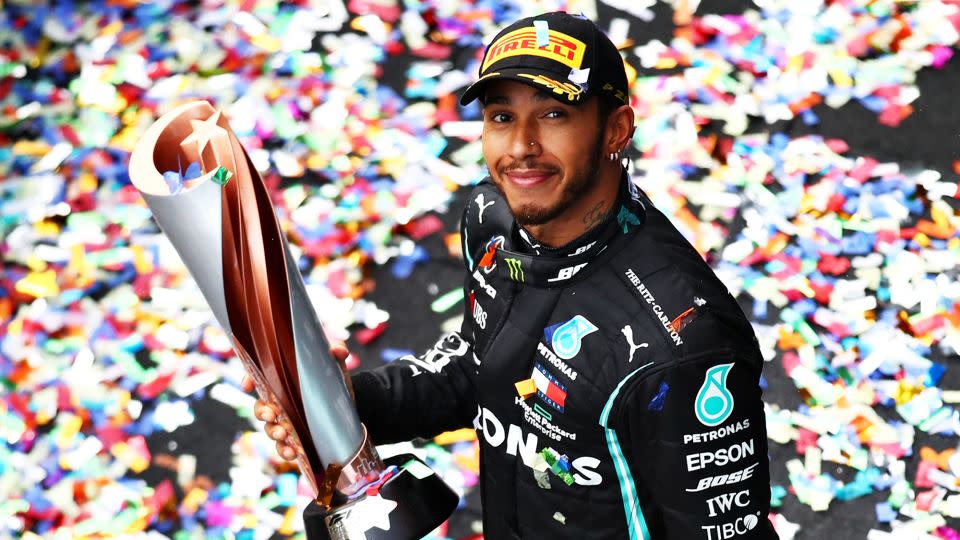 Hamilton celebrates after winning his seventh world championship. - Bryn Lennon/Getty Images