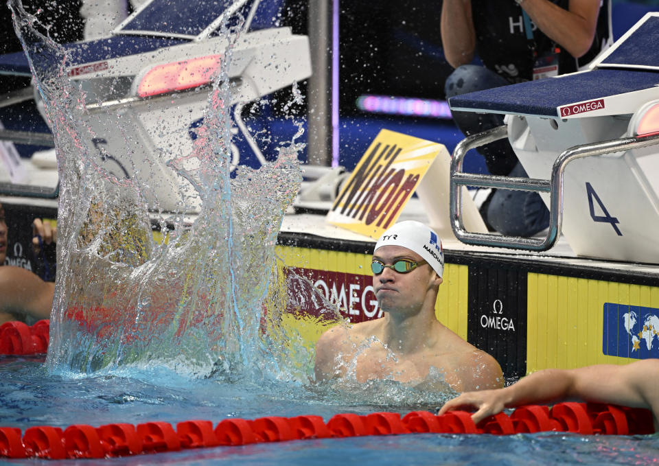 Leon Marchand of France reacts after the Men 200m Medley final at the 19th FINA World Championships in Budapest, Hungary, Wednesday, June 22, 2022. (AP Photo/Anna Szilagyi)