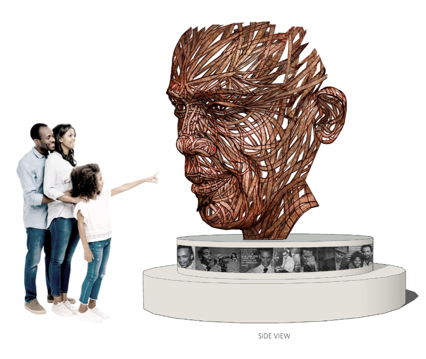 James Dinh and Michael Stutz's proposed sculpture will depict the face of Quincy Jones set atop a pedestal featuring images of Jones' collaborators and life in Bremerton. Stutz will craft the sculpture while Dinh will craft the pedestal. The proposed image is not an exact estimation of the final product.