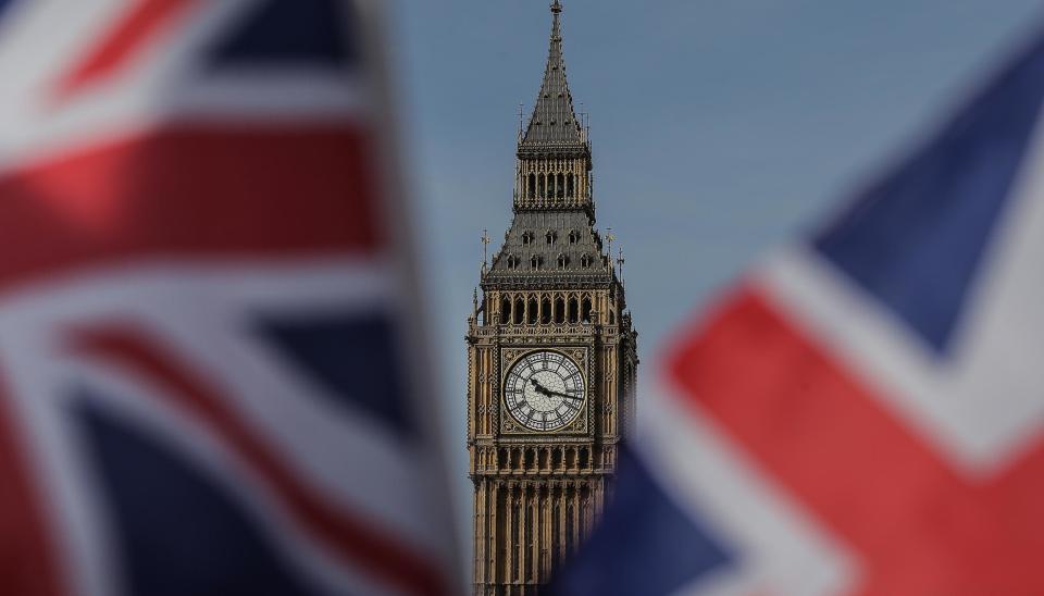 Union flags fly near the Houses of Parliament: Getty