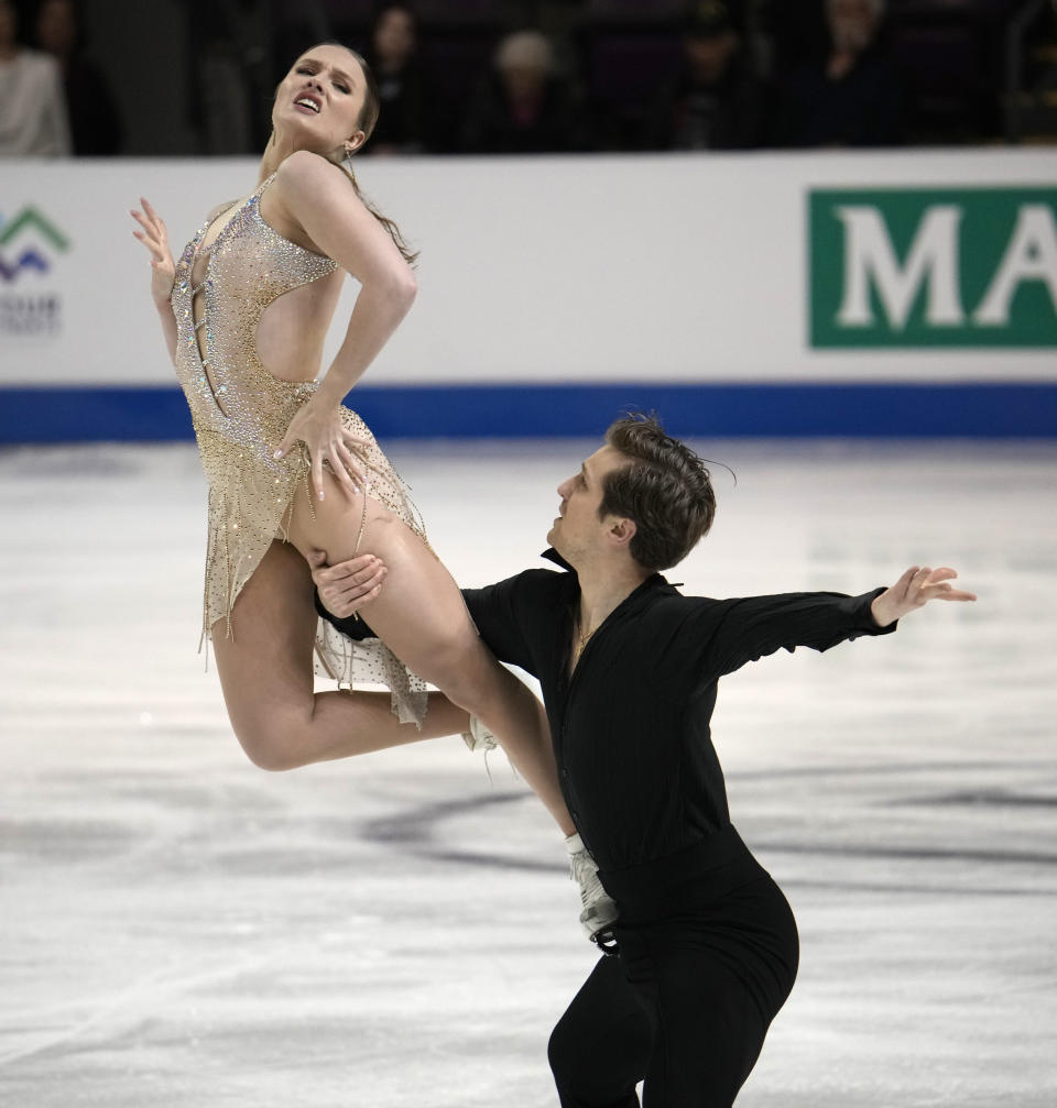 Christina Carreira and Anthony Ponomarenko, of the United States, perform in the ice dance rhythm dance program at the Four Continents Figure Skating Championships, Friday, Feb. 10, 2023, in Colorado Springs, Colo. (AP Photo/David Zalubowski)