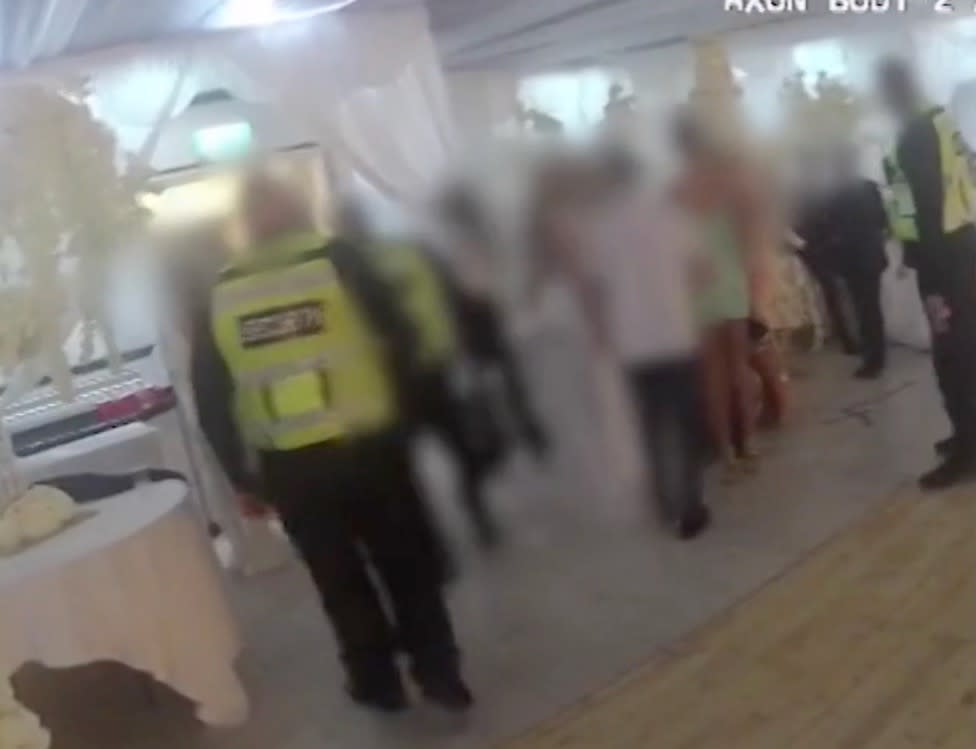 Footage from body-worn cameras released by the Met Police showed guests at the west London wedding (Met Police)