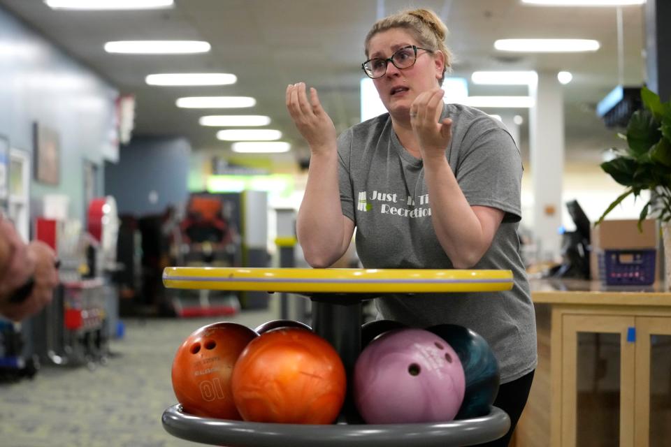 Samantha Juray gets emotional while recalling the events of the mass shooting last October at the bowling alley she owns with her husband, Wednesday, May 1, 2024, in Lewiston, Maine. (AP Photo/Robert F. Bukaty)