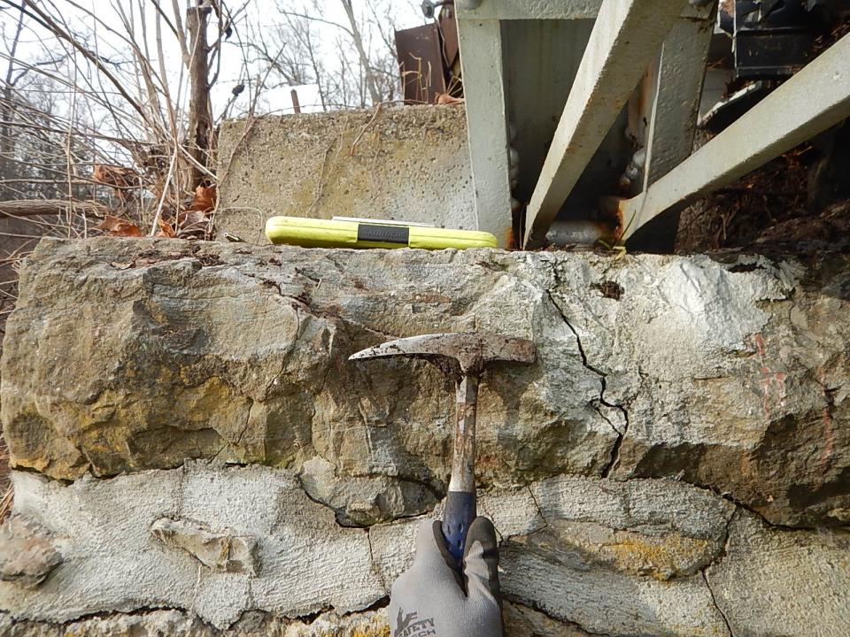 This photo shows the crack in the foundation of the Main Street, Walpack bridge over the Flatbrook.