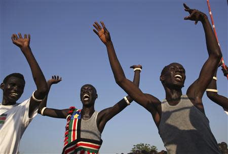 Men sing and dance as they celebrate referendum results in Abyei October 31, 2013. REUTERS/Goran Tomasevic