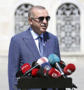 Turkey's President Recep Tayyip Erdogan speaks to supporters and the media after Friday prayers in Hagia Sophia, in Istanbul, Friday, Aug. 7, 2020. Erdogan joined worshipers on July 24 for the first Muslim prayers in 86 years inside the Istanbul landmark that served as one of Christendom's most significant cathedrals, a mosque and a museum before its conversion back into a Muslim place of worship.Turkey's president has called a maritime deal between Greece and Egypt "worthless," saying Turkey will resume oil and gas exploration in the Eastern Mediterranean.(Turkish Presidency via AP, Pool)