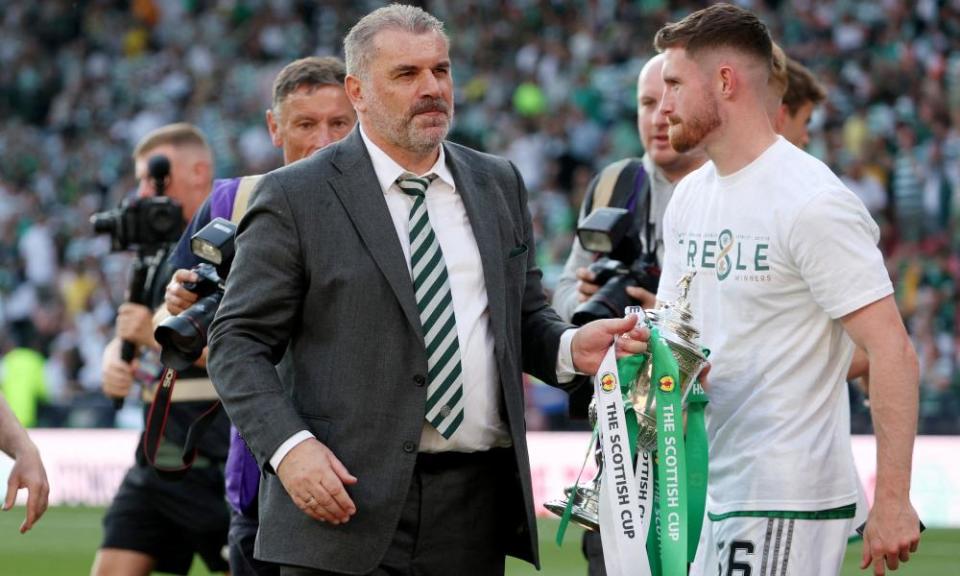 Ange Postecoglou celebrates with the Scottish Cup trophy