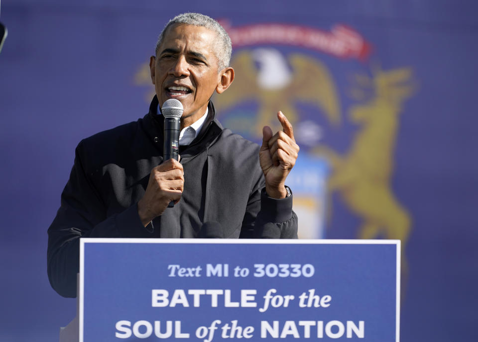 Former President Barack Obama speaks at a rally for Democratic presidential candidate former Vice President Joe Biden, at Northwestern High School in Flint, Mich., Saturday, Oct. 31, 2020. (AP Photo/Andrew Harnik)