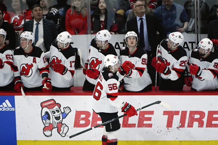 New Jersey Devils left wing Erik Haula (56) celebrates his goal against the Chicago Blackhawks during the second period at the United Center.