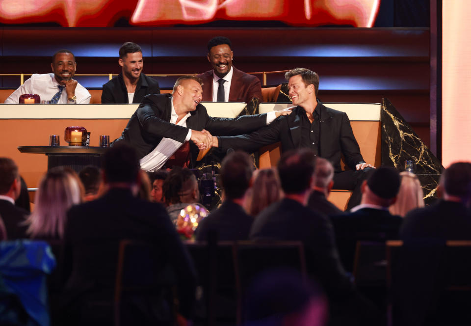 INGLEWOOD, CALIFORNIA - MAY 05: Rob Gronkowski (L) and Tom Brady (R) speak onstage during G.R.O.A.T The Greatest Roast Of All Time: Tom Brady for the Netflix is a Joke Festival at The Kia Forum on May 05, 2024 in Inglewood, California.  (Photo by Matt Winkelmeyer/Getty Images for Netflix)