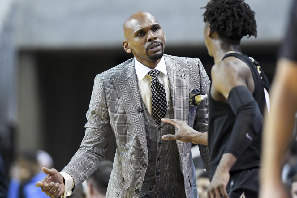 Vanderbilt coach Jerry Stackhouse talks with guard Saben Lee (0) during a timeout in the first half of the team's NCAA college basketball game against Auburn on Wednesday, Jan. 8, 2020, in Auburn, Ala. (AP Photo/Julie Bennett)